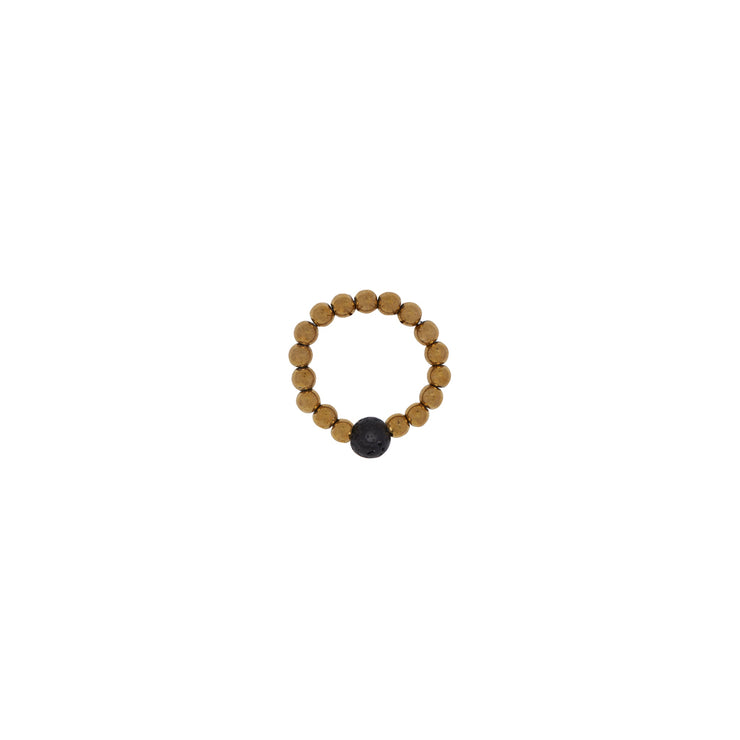 Gold tone beaded ring with black lava focal