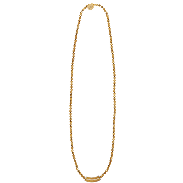Long gold tone necklace in hematite and acrylic focal bead