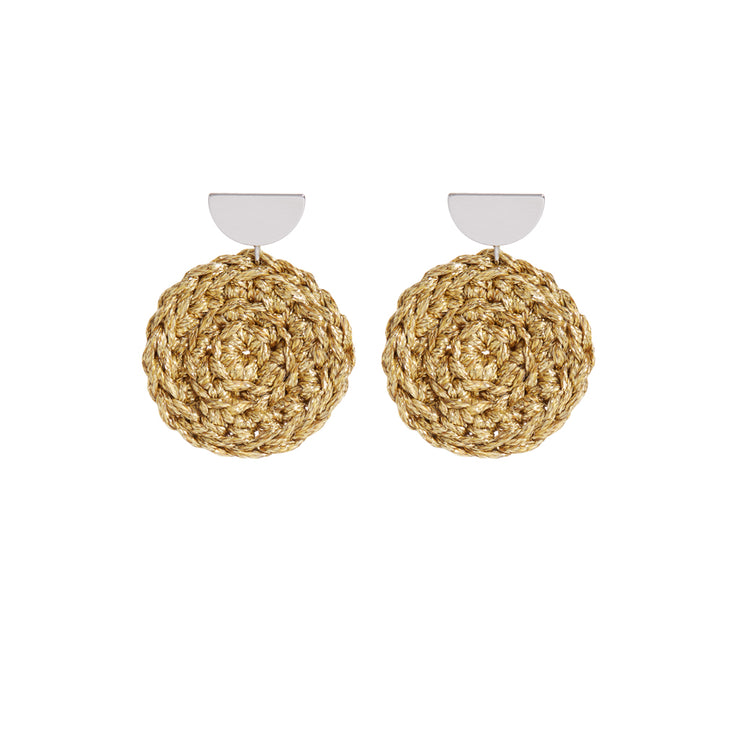 Pair of medium sized front facing hand crocheted hoops in mixed metal tones. Silver tone semi circle earring posts and hand crocheted gold tone circles.