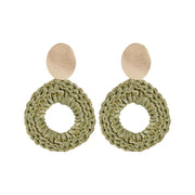 Pair of hand crocheted statement front facing hoop style statement earrings in olive green and gold with oval gold plated posts
