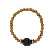 A bracelet of gold tone hematite, black lava and silver plated zamak beads