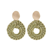 Pair of medium sized lightweight front facing hoop style earrings in gold and olive green with oval gold plated posts