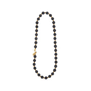 Long black and gold necklace with chunky black lava and smaller gold tone hematite  gemstones