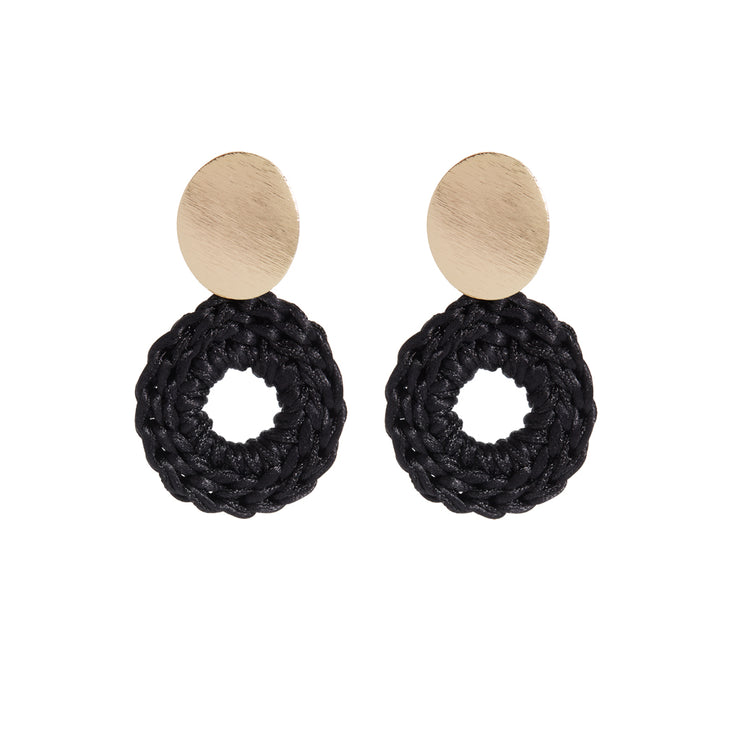 Pair of front facing hoops in black with oval gold tone earring posts.